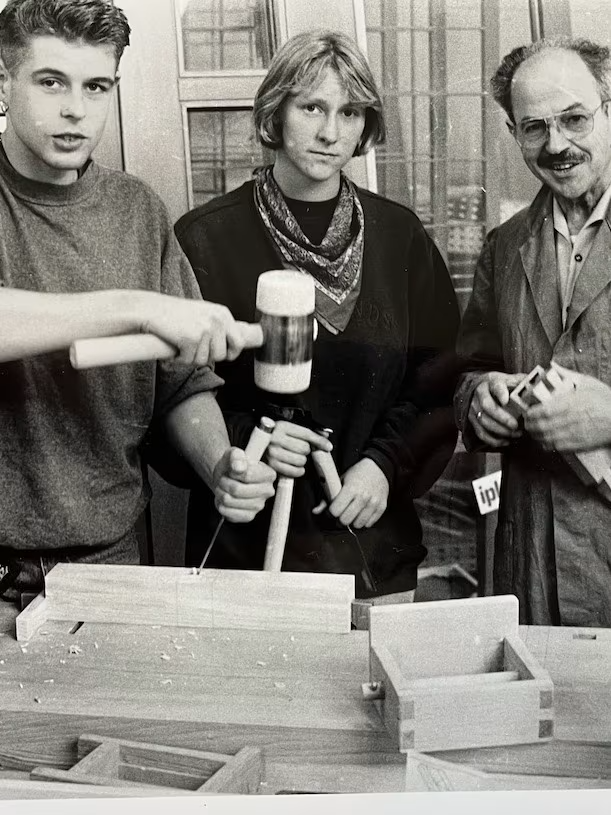 Hubert Appelhans training young craftsmen in the workshop