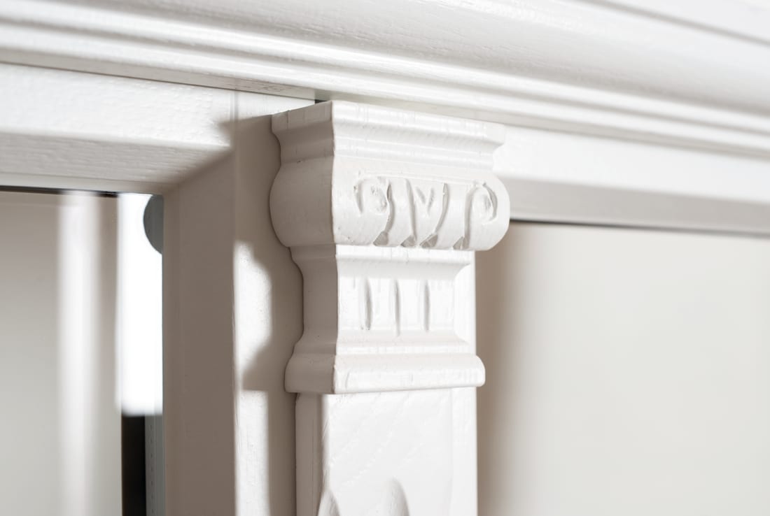 Detail of an ornate wood corbel accent