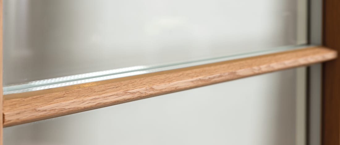 Detail of a wood window's glazing edge