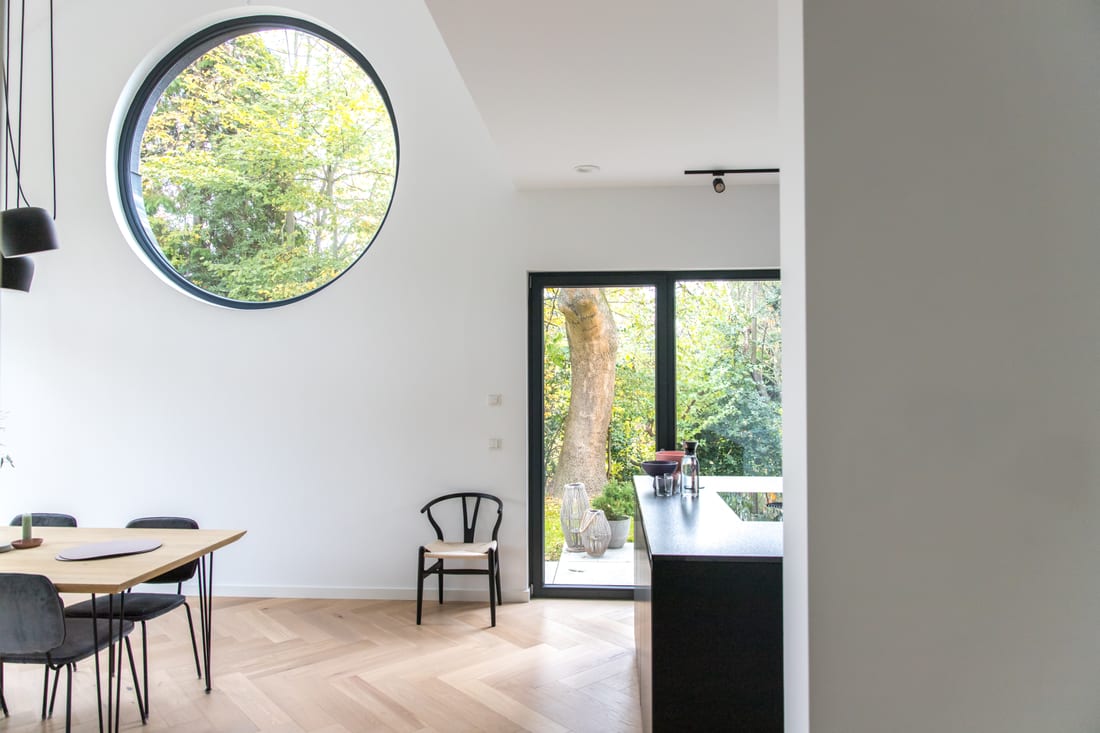 A custom round Sorpetaler window in a modern home
